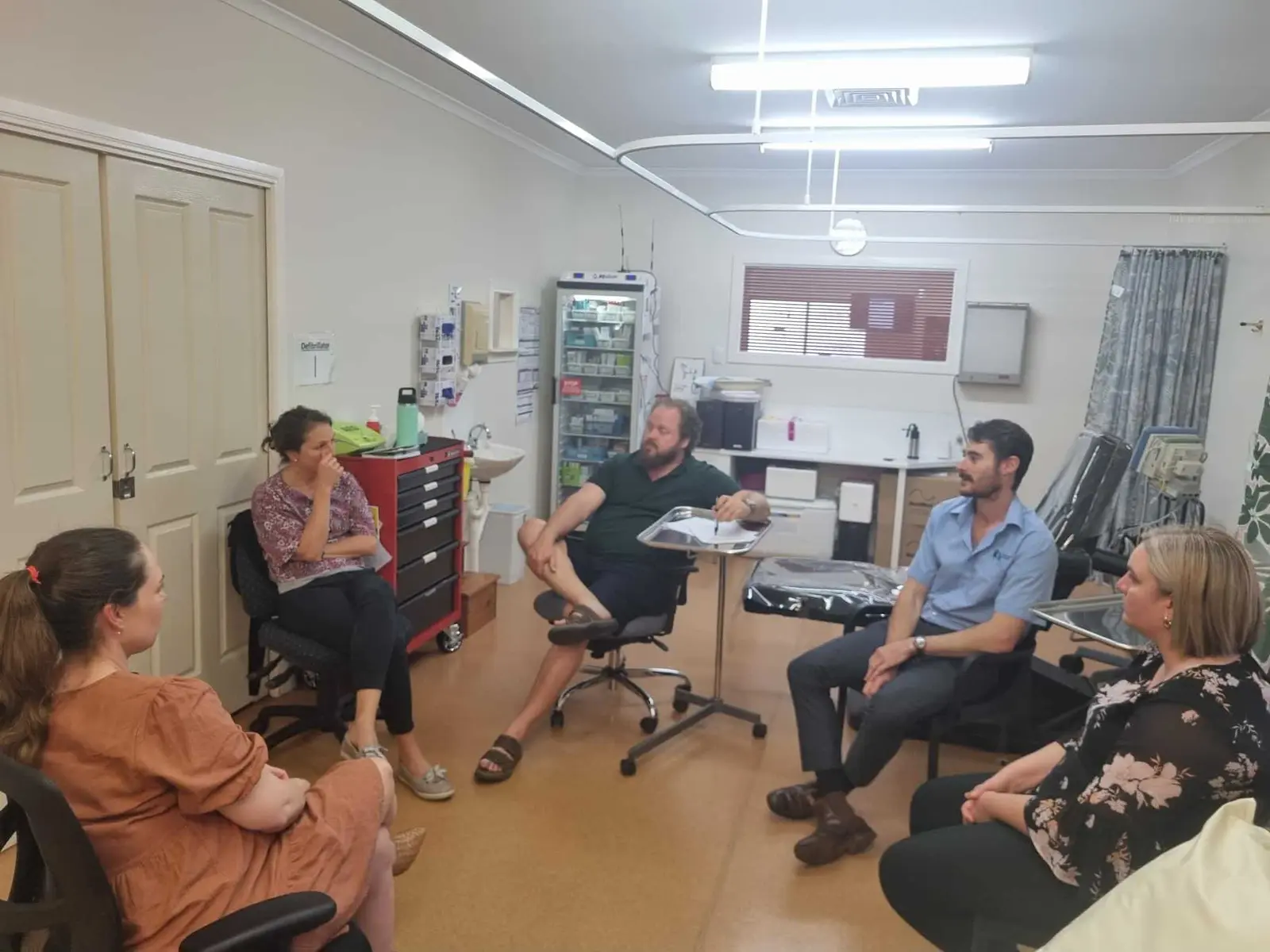 Atherton Health Hub clinicians and team members in a collaborative practice meeting